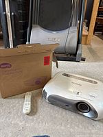 Projector, remote and BenQ box group shot