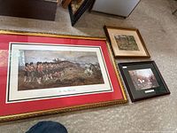 Large Thin Red Line print plus two smaller framed prints on floor