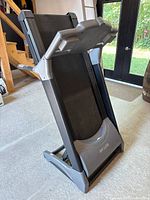 treadmill folded upright