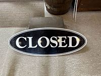 Side showing CLOSED text