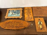 Multiple plaques showing text and images