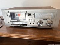 Front view showing cassette bay, controls and Sanyo branding