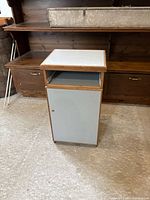 Front and side view showing cabinet exterior, door closed, overall finish