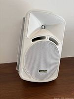 Front view showing Tortech branding, grille and horn tweeter