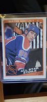 Front image of the 1984-85 OPC Wayne Gretzky All Star hockey card showing Gretzky in Edmonton Oilers uniform.