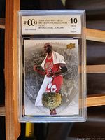 Front side of 2009-10 Upper Deck MJ Legacy Collection Gold Michael Jordan card in BCCG plastic grading case.
