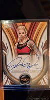 Front of the autographed Jessamyn Duke WWE NXT trading card featuring her image and signature.