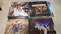 Four Elton John LPs: Honky Château; Don’t Shoot Me I'm Only the Piano Player; Captain Fantastic; Greatest Hits Volume II