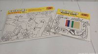 Two Color-Me children's coloring items: a placemat featuring animal drawings and an incentive chart with colorful sticker strips, both new old stock.