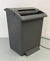 Front angle view of the black GBC ShredMaster 805 paper shredder showing its overall shape and controls on top.