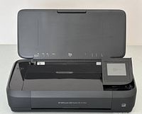 Top view with input tray open and display panel visible