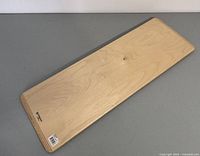 Top view of the solid laminated wood transfer board showing natural wood grain and rounded corners