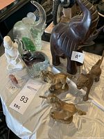 Photo of all eight items showing size variations and general appearance on white cloth