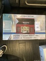 Top view photo of the CRAIG 5-in-1 Turntable System box showing front of the box with image and branding