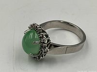 Side view of ring showing profile of setting and jade cabochon