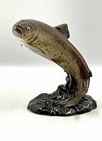 Front and side view of the trout figurine showing detailed paint and shape.