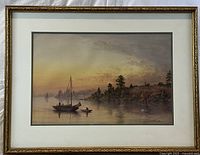 Frontal view of framed marine watercolor showing sailboat and shoreline at dusk
