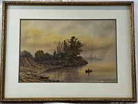 Full front view of framed watercolor painting on neutral tabletop