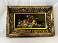 Full front view of framed oil painting