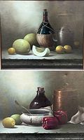 Two framed still life oil paintings by Victor Santos, showing the complete artworks with fruit, bottles and kitchenware.