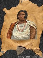 Full view of oil portrait of Native Mexican woman painted on deer hide