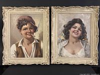 Front view of both boy and girl paintings side by side showing details and frames.