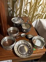 Overview of all lot items on wooden surface