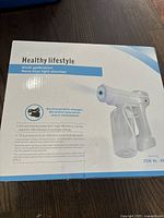 Box of the Healthy lifestyle Ninth generation Nano blue light atomizer showing product image and description of features including wireless operation and 180-minute usage time per charge.