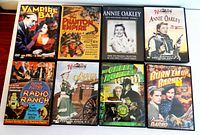 Eight DVD cases shown including horror, action serials and Westerns