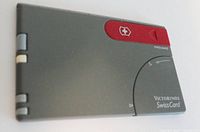 Closed grey Victorinox SwissCard with red section and Swiss cross logo