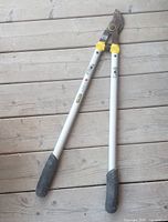 Stanley Accuscape extendible garden loppers laid flat showing overall condition and handle grips