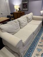 Full view of IKEA Ektorp sofa showing overall condition and color.