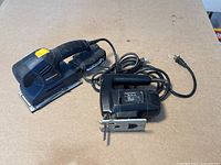 Both power tools placed side by side showing overall condition and cords