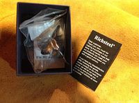 Ring in dark box with card showing Richsteel brand and customer message.