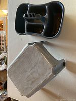 Top view of plastic step stool and bin showing condition and details