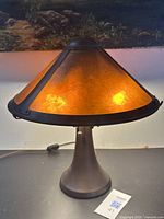 Lamp illuminated showing amber mica shade exterior