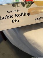 Photo of Marble Rolling Pin box with brand Fox Run and description on box