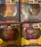 Front view of four boxed Funko Dorbz figures showing Daredevil (top left), Nebula (top right), Scarlet Witch (bottom left), and Magneto (bottom right).