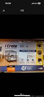Box packaging showing product specifications and features of MidWest iCrate folding dog crate medium size.