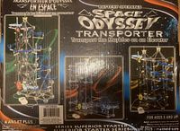 Front and side image of factory sealed Space Odyssey Transporter box showing battery operated marble elevator game with labeled parts and age recommendation.
