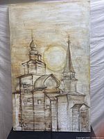 Full view of the acrylic painting depicting architectural elements with a sun shape, using earthy tones and showing unframed edges.