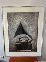 Full view of framed abstract painting showing composition and frame