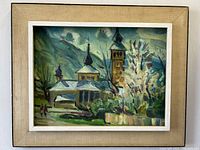 Full front view of oil painting in frame showing towers, trees and figures