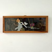 Full view of framed mixed media original collage art showing piano player and Victorian images background.