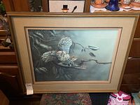 Frontal image of the framed owl print showing the entire artwork and frame.