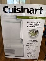 Photo of Cuisinart Ice Cream Maker box showing product features and branding