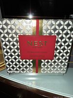 Nest Sparkling Cassis scented candle in decorative boxed packaging