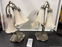 Pair of matching Tiffany style lily pond accent lamps, showing both lamps side by side on a white backdrop.