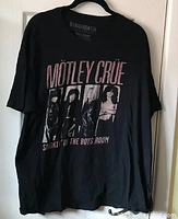 Full front view of black Motley Crue t-shirt showing band photo and logo with Smokin' in the Boys Room text.
