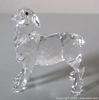 Crystal sheep figurine showing faceted body and jet hematite eyes